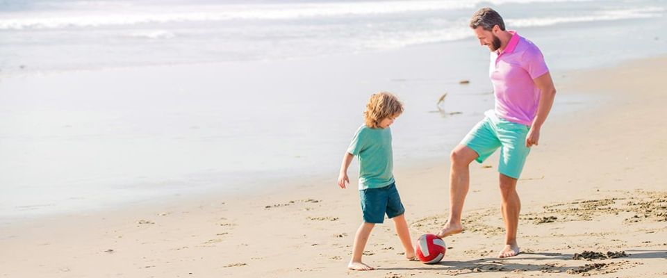 Dad and son on the beach