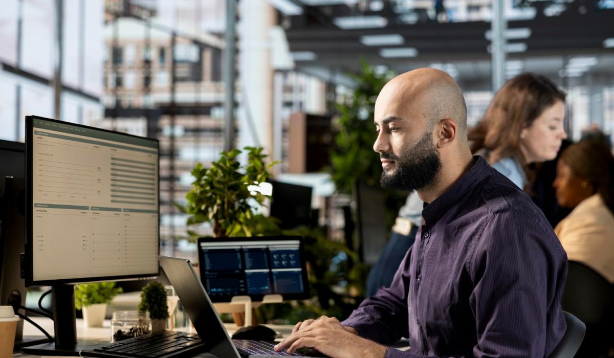 Proffesional worker on laptop